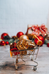christmas shopping cart with gifts © VikaEmerson