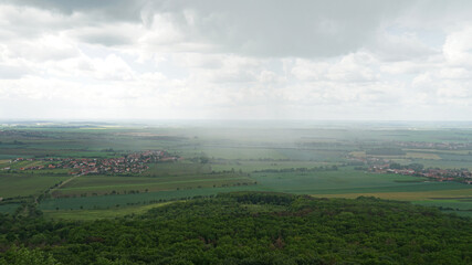 Obraz premium Spring heavy shower aerial view from Rip Mountain, Czech Republic