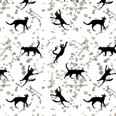 Black cats on a background of splashes and springs, seamless background for gifts and children's fabrics