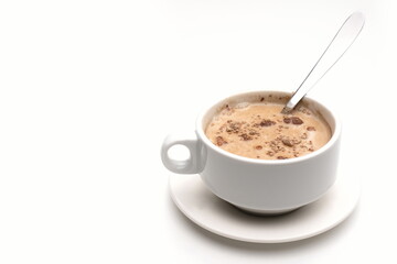Cup of cocoa with lumps on white background