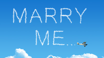 Fototapeta premium marry me airplane smoke trail on blue sky
