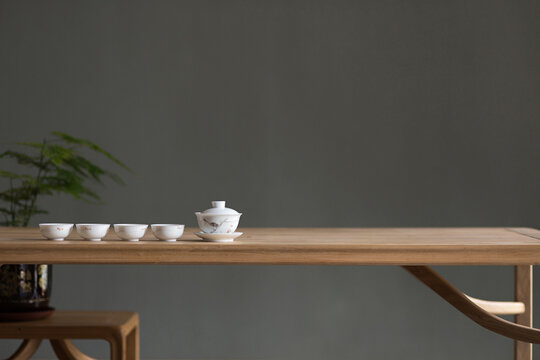 Bowls Against Gray Background On Wooden Table