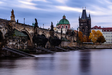 An autumn morning at the Charles Bridge in the historic center of Prague. 