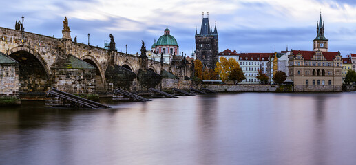 An autumn morning at the Charles Bridge in the historic center of Prague. 