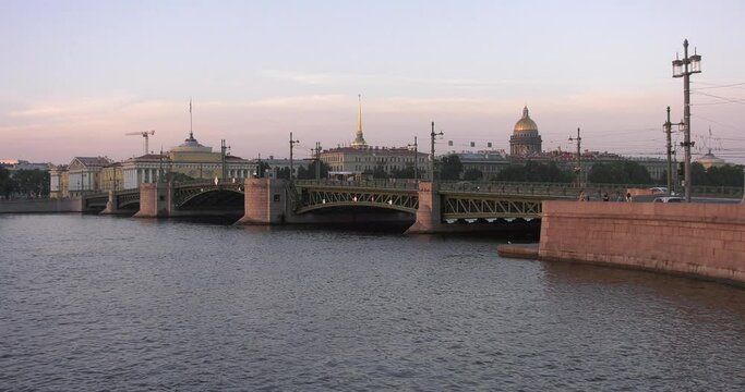 4K sunrise video of beautiful architecture of Saint Petersburg city center, Admiralteystvo Admiralty (Navy headquarters) historical building near Saint Isaac's Cathedral, Neva River embankment, Russia