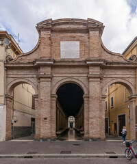 The entrance portal to the ancient fish market in the historic center of Rimini, Italy