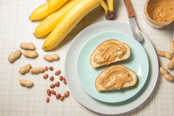 Two slice of peanut butter sandwich on a plate