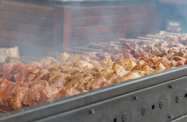 meat on skewers, grilling delicious shish kebab