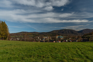 View for Hejnice town in Jizerske mountains in sunny autumn day