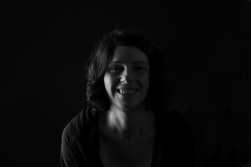 Obraz premium portrait of a woman on black background