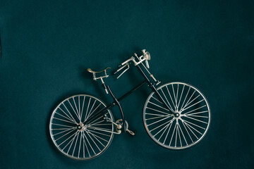 Aged Vintage black old bike with close up on dark background