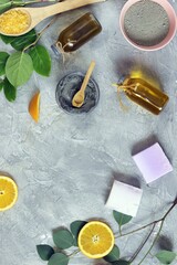 Aromatic oil, blue clay, citrus slices, natural soap - ingredients for mask, scrub, home body care, healthy lifestyle