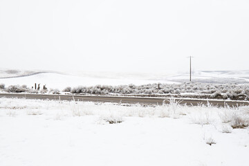 Country Road Through a Winter Landscape with Snow