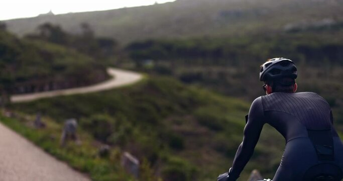 riding on the back of a bicycle