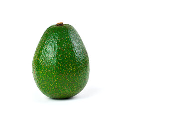 Fruit background with ripe avocado on white background. Side view with space for copying. The concept of natural products.