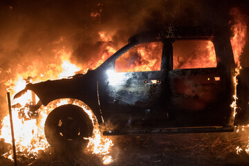 Pick-up caught on fire. Blazing flame. © Steve