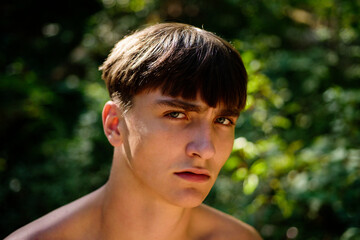 Closeup portrait of young man. Handsome guy with confident face.