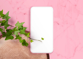 Realistic modern smartphone on pastel background. Mock up for game design, mobile application, wallpapers, websites. Plant and shadows.