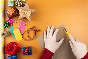 Fototapeta premium Gift boxes and wrapping paper on the table