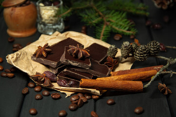 Black chocolate with cinnamon. Fragrant black coffee. Christmas evening.