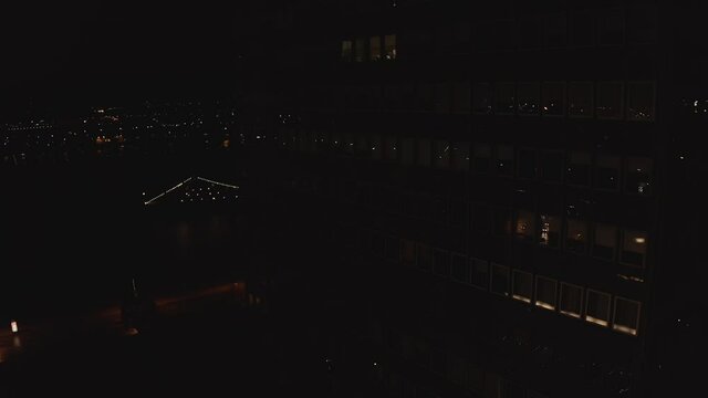 Flying over Riga at night during Staro Riga event. Beautiful illumination of Riga, Latvia.