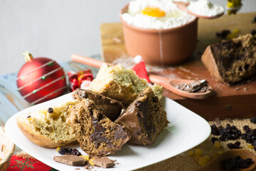 Christmas panettone on rustic table. some table decorations