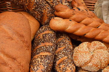 Fresh bread buns and loaves on retail display
