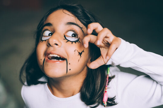 Girl with Halloween face paint