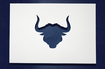 Fototapeta premium Happy bull year. Christmas tendy card 2021. silhouette of a grey bull. Chinese Zodiac. Chinese new year 2021. paper cut style. paper cut bull. Happy new year