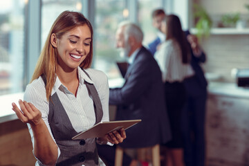 Business woman hold white blank paper. Young smiling.