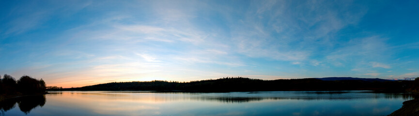 Obraz na płótnie Canvas Panorama lake view in sunrise time /Sunrise at the lake