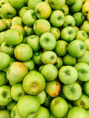 lots of ripe fruit sweet apples for cooking as a background