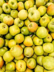 lots of ripe fruit sweet apples for cooking as a background