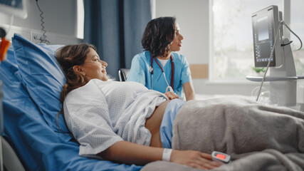 Hospital Ward: Beautiful Pregnant Hispanic Woman Getting Sonogram / Ultrasound Screening / Scan,...