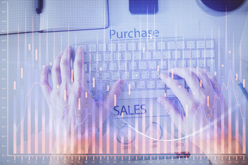 Double exposure of man's hands typing over laptop keyboard and forex chart hologram drawing. Top view. Financial markets concept.