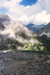 Fototapeta na wymiar Experience the breathtaking beauty of the high alpine mountain landscape of the Zugspitze area in the Alps, with its stunning peaks and tranquil atmosphere. Perfect for outdoor activities and nature