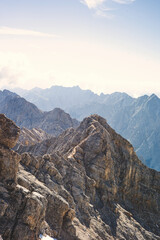 Experience the breathtaking beauty of the high alpine mountain landscape of the Zugspitze area in the Alps, with its stunning peaks and tranquil atmosphere. Perfect for outdoor activities and nature