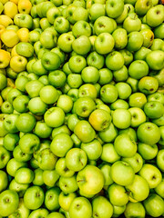 lots of ripe fruit sweet apples for cooking as a background