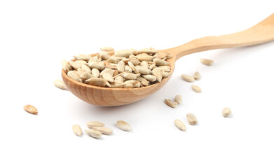 Peeled sunflower seeds in spoon on white background, closeup