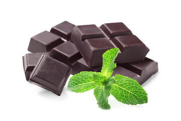 Tasty dark chocolate pieces and mint on white background