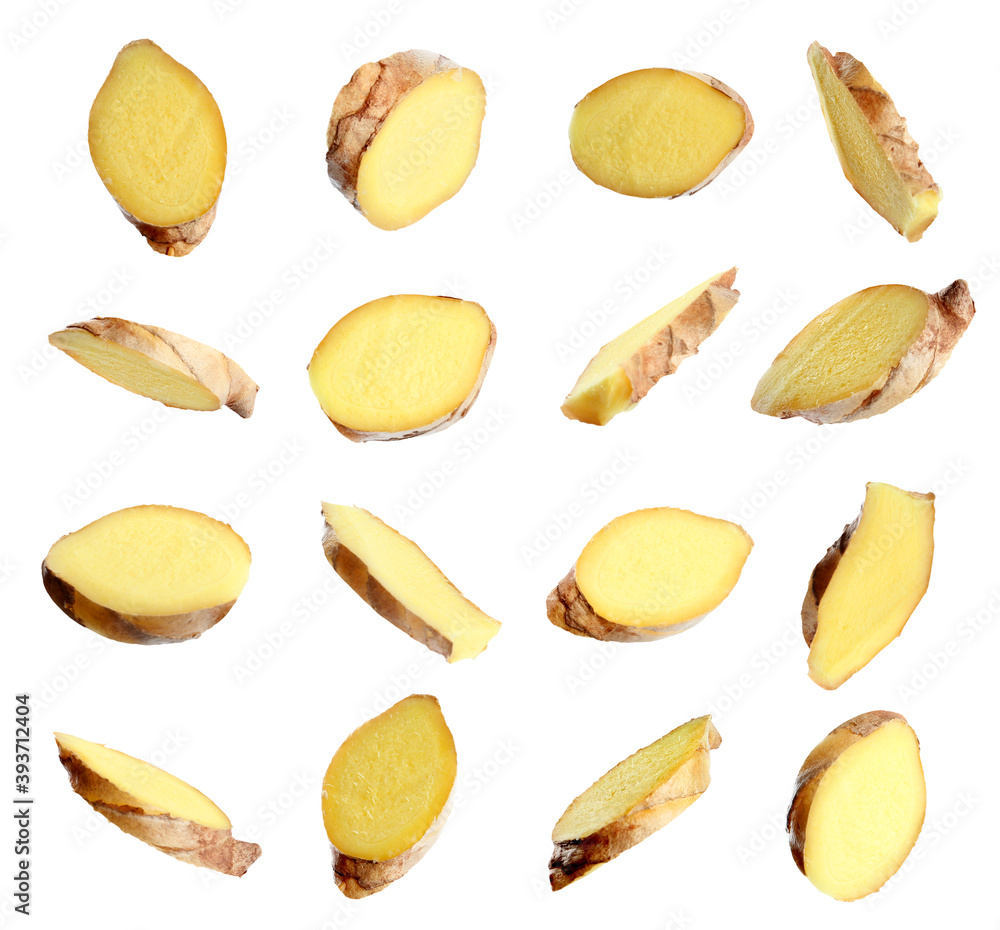 Wall mural set of fresh ginger slices on white background