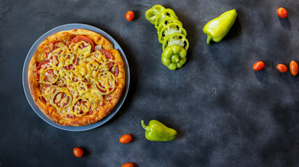 vegetarian pizza with peppers and tomatoes