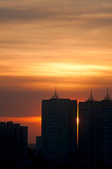 The evening sun sets over the horizon