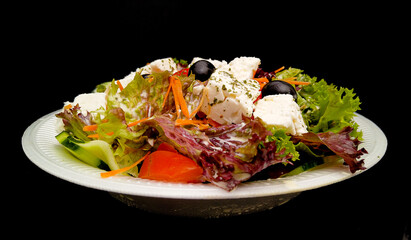Fresh Greek Salad with feta chesse and olives - food photography