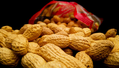 Roasted peanuts in close up - food photography