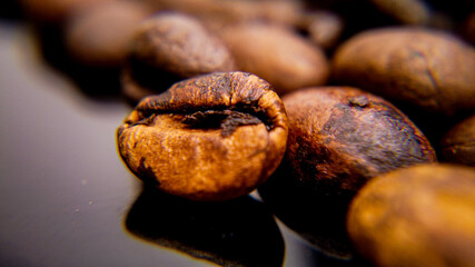 Macro shot over roasted coffee beans - food photography