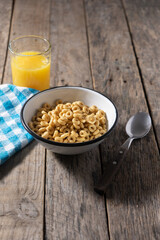 Cereal bowl for breakfast on wooden background