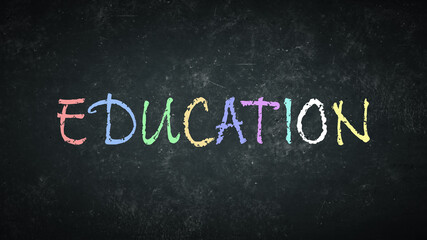 Term Education on a rustic blackboard.