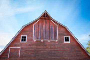 faded red barn in rural Washington state