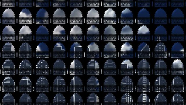 Background with motion tile from gothic windows reflecting the modern city in them. Upward movement of the camera. Abstraction for a concert or themed background